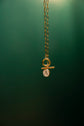 Le collier médaillon rond avec initiale personnalisable