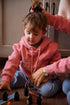 Le sweat bichette rose à capuche des kids